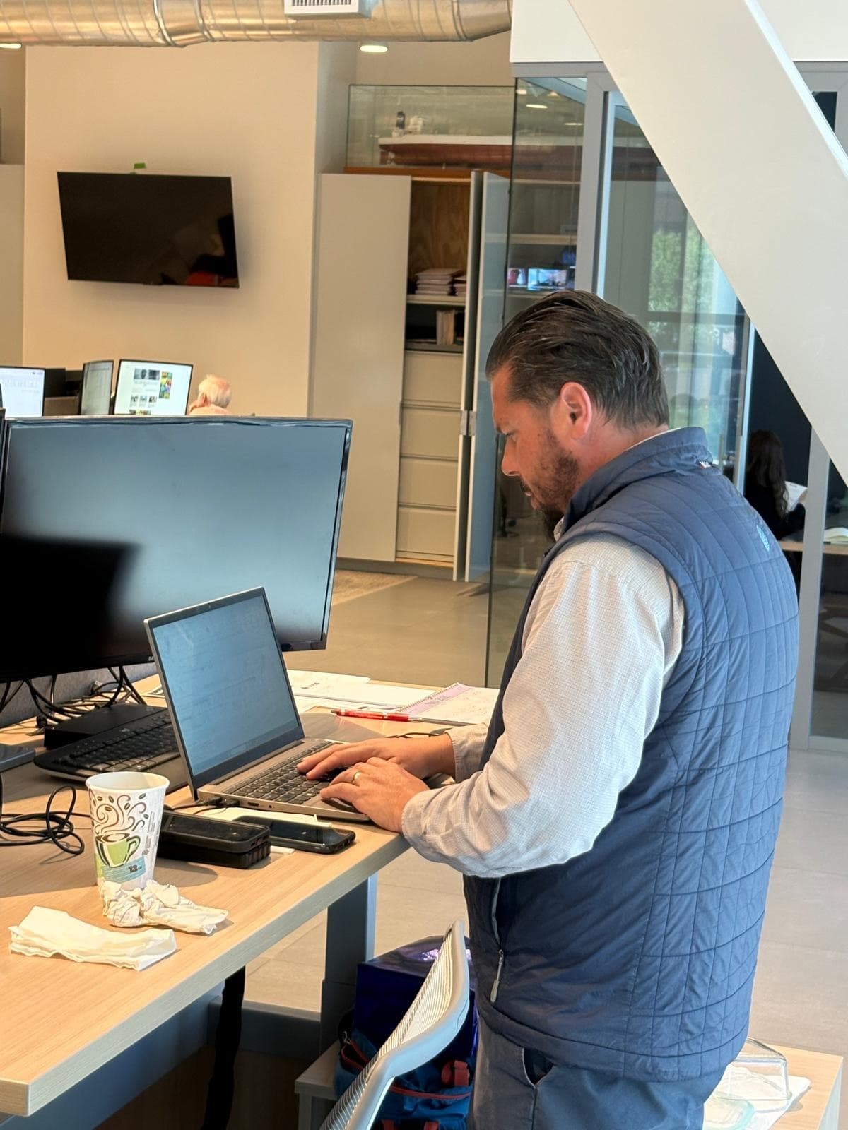 MJLF team member working at a laptop